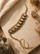 Load image into Gallery viewer, Collar con caracoles ,Protección ,Muñeco,